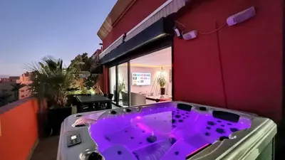 a purple bath tub sitting on the side of a building at Exceptional View & Hot Tub Marrakesh in Marrakech