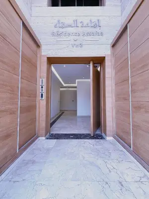 an entrance to a building with a sign on it at Modernes Apartment in Top-Lage in Guéliz Marrakech in Marrakech