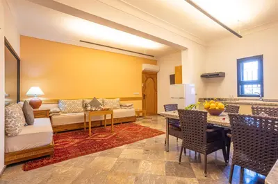 a living room with a couch and a table at Maison safou in Marrakech