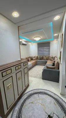 a large living room with couches and a couch at Le Joyau de la Ville in Marrakech