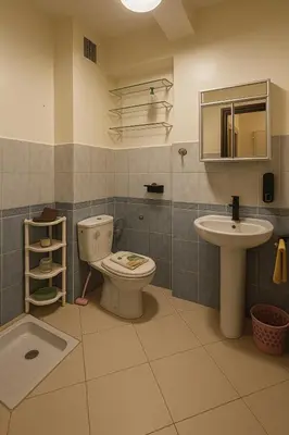 a bathroom with a toilet and a sink at Your favorite stay - 5min to M avenue & Gueliz in Marrakech