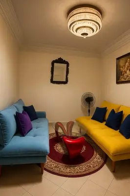 a living room with two couches and a table at Your favorite stay - 5min to M avenue & Gueliz in Marrakech