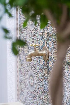 a close up of a door with a tap at Riad Authentique en Exclusivité in Marrakech