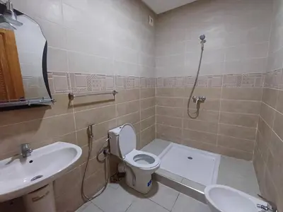 a bathroom with a toilet and a sink at Villa Targa in Marrakech