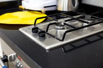 a stove top with a yellow pancake on it at Gueliz Gem Chic, Comfy & Central in Marrakech