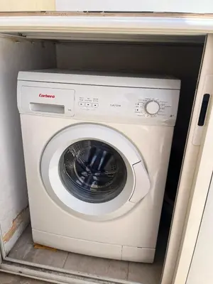 a washer and dryer sitting inside of a refrigerator at Apartment with pool in Guéliz Hadika al koubra in Marrakech