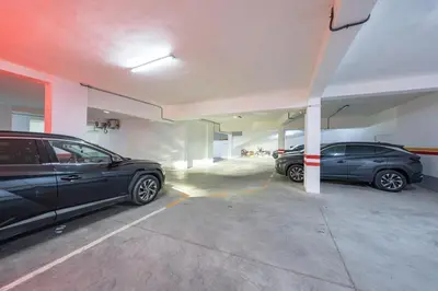two cars parked in a parking garage at Appartement in Marrakech in Marrakech
