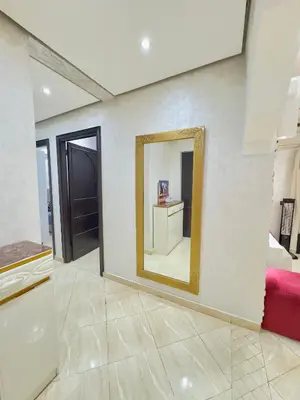 a mirror on a wall in a room at Marrakech in Marrakech
