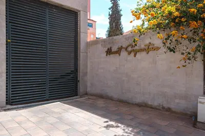 a gate to a wall with the word congratulations written on it at Modern and Cozy Apartment Center of Marrakech in Marrakech