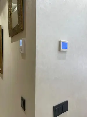 a wall with two electrical boxes on a wall at Apartment for rent in Marrakech