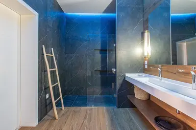 a bathroom with a sink and a mirror at Villa Safiya, Piscine Chauffée & jeux in Marrakech