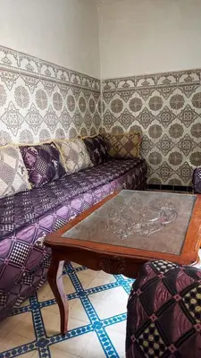 a living room with a couch and a coffee table at light stay in Marrakech