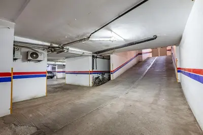 an empty hallway in an empty parking garage at Marguerite de Guéliz Piscine & Parking in Marrakech