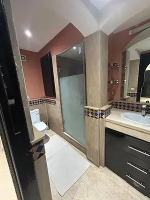 a bathroom with a shower and a sink at Luxury Gueliz Apartment-Miramas 2 in Marrakech