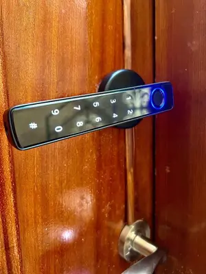 a close up of a door handle on a wooden door at Marrakech home in Marrakech