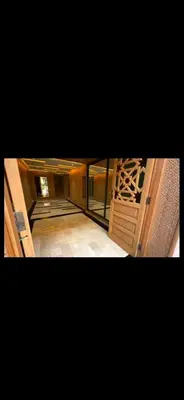 a view of an empty room with a wine cellar at Sérénité en plein Marrakech in Marrakech