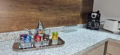 a tray of glasses sitting on a kitchen counter at Elegant & Chic Retreat, Pool, Prime Location in Marrakech