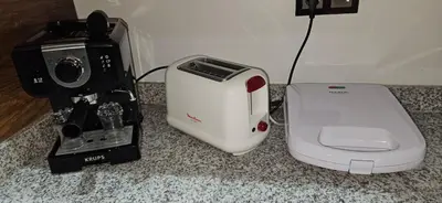 a blender and a toaster sitting on a counter at Elegant & Chic Retreat, Pool, Prime Location in Marrakech