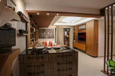a kitchen with a sink and a living room at The Modern Luxury - Marrakech in Marrakech