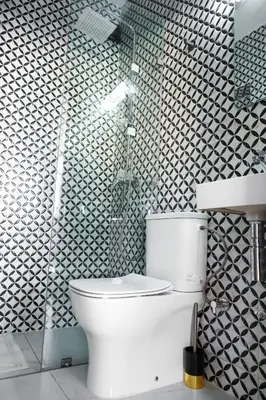 a bathroom with a toilet and a shower at Marjane Allal Fassi 2 chambres Bedrooms 2 Bathrooms Wi-Fi fibre climatisation in Marrakech