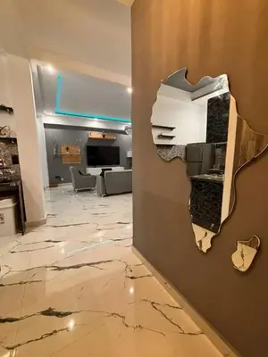 a broken wall in a room with a living room at Appartement moderne in Marrakech