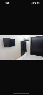 a black and white picture of a room with a kitchen at Big confort in Marrakech