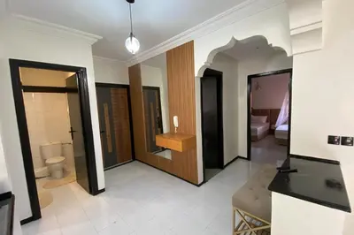 a room with a bathroom with a toilet and a sink at Condominium in Marrakech