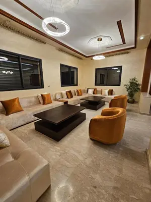 a large living room with couches and tables at Villa in Marrakech in Marrakech