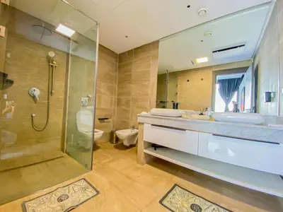 a bathroom with a shower and a sink and a toilet at villas route d amzmiz in Marrakech