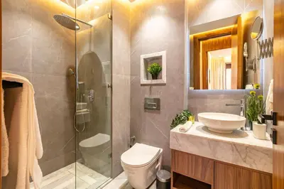 a bathroom with a toilet and a sink and a shower at HS14 Luxury 2Chambres Gueliz TopCenter in Marrakech