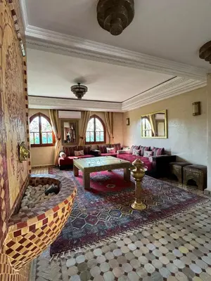 a large living room with a pool table in it at Luxury Private Riad, Air-Conditioned and Pool in Marrakech