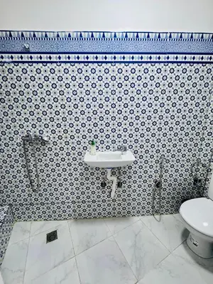 a bathroom with a sink and a toilet at Maison N 07 in Marrakech