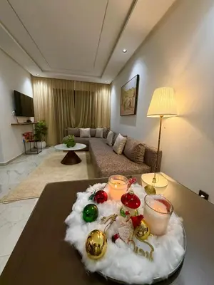a living room with a table with christmas decorations on it at Marrakech charme urbain à l'hivernage in Marrakech
