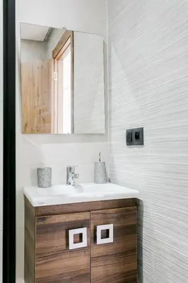 a bathroom with a sink and a mirror at Pearl of Nour Prestige in Marrakech