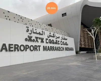 a building with a sign for aazport marriott namespace at The Smooth Stay Marrakech Pool in Marrakech