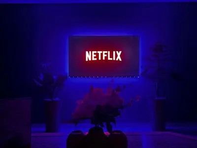 a neon sign in a blue room with a netflix sign at Suite Majorelle l Gueliz,balcon,clim, Netflix,WiFi in Marrakech