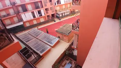 an aerial view of a building with solar panels on it at Appart Majorelle in Marrakech