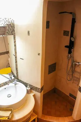a bathroom with a sink and a shower at VERY RARE APARTMENT GUELIZ CENTER OF Marrakech in Marrakech