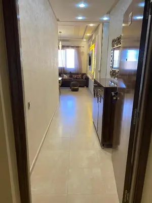 a hallway leading to a room with a living room at pleasant stay in Marrakesh in Marrakech