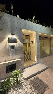 a building with a number on the side of it at Villa Talya in Marrakech