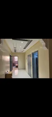 an empty room with a hallway with doors and a room with at Chambre Marrakech 1 in Marrakech