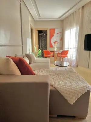 a living room with a couch and a table at Homekesh in Marrakech