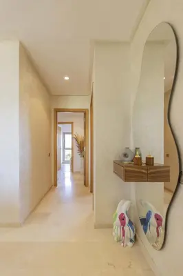 a hallway of a house with a mirror at Beautiful 3 bedroom apartment for 6 people Prestigia Golf Saphir in Marrakech