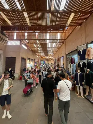 a group of people walking through a store with a crowd at Riad Maaffar in Marrakech