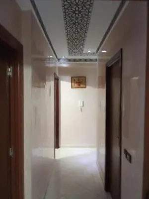 an empty hallway with a room with a ceiling at شقة بغرفتين نوم لك بالكامل in Marrakech