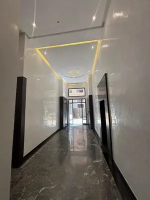 a hallway of a building with a ceiling and a hallwayngthngthngthngthngth at Nice apartment in Marrakesh in Marrakech
