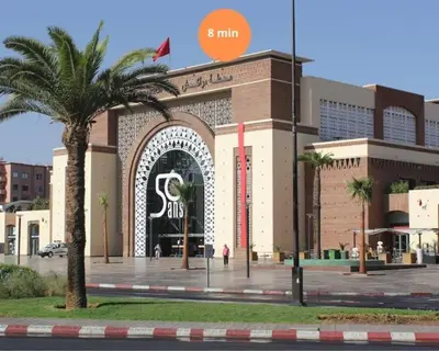 a large building with a large gate in front of it at Nour Prestige in Marrakech