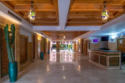 a lobby of a hotel with wooden ceilings at Apartment for rent Wintering in Marrakech