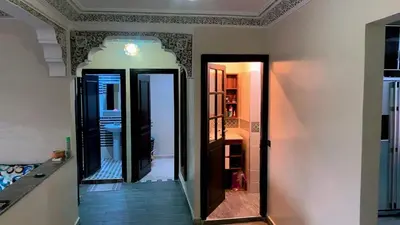 a hallway with a mirror in a room at Le Nid de Vacances in Marrakech