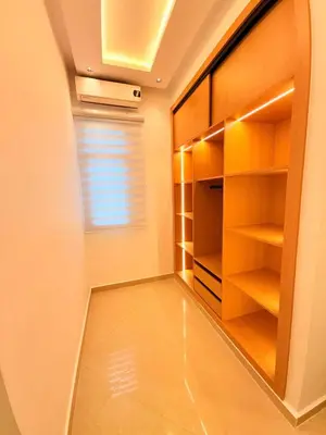 a room with a walk in closet with a window at Villa Patel in Marrakech